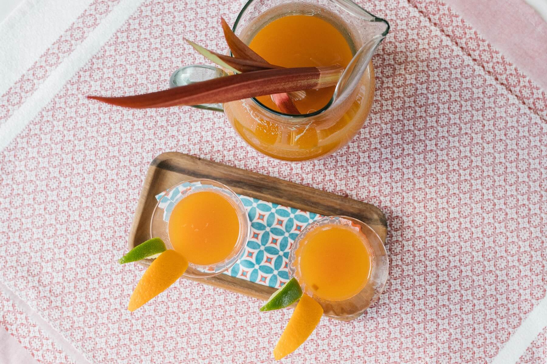 Rhubarb cordial in 2 glasses and jug