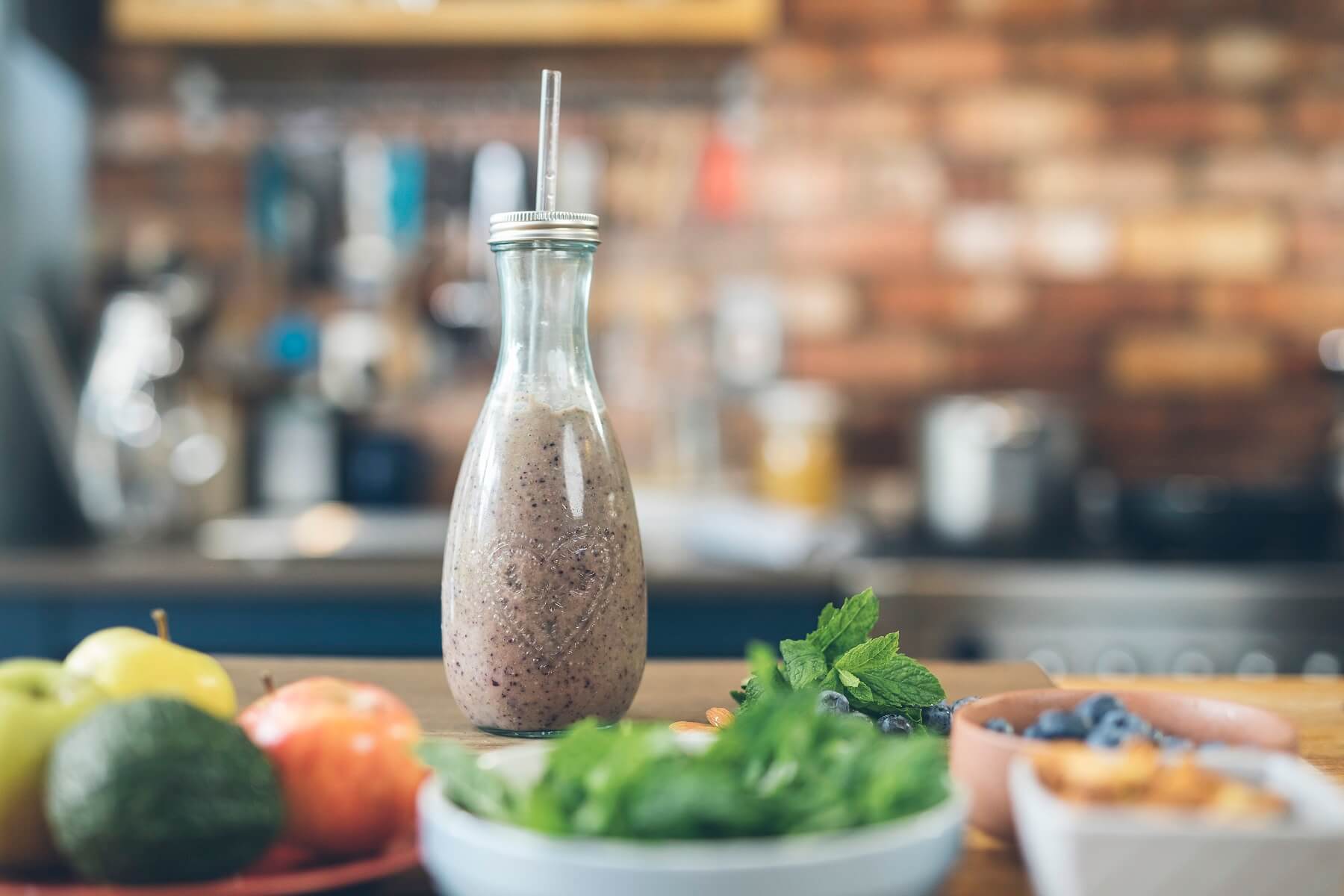 Winter Immune Booster Smoothie in jar with straw